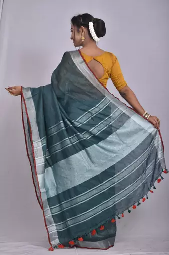Handmade bhagalpuri linen saree with contrast border in dark green shade with blouse piece
