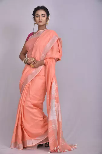 Handmade bhagalpuri linen saree with contrast border in light orange shade with blouse piece