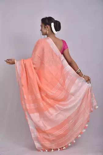 Handmade bhagalpuri linen saree with contrast border in light orange shade with blouse piece