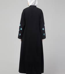 Black abaya with butterfly embroidered sleeve and hijab