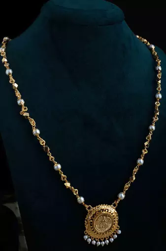 Long Gold & White Beaded Necklace with Laxmi Round Pendant
