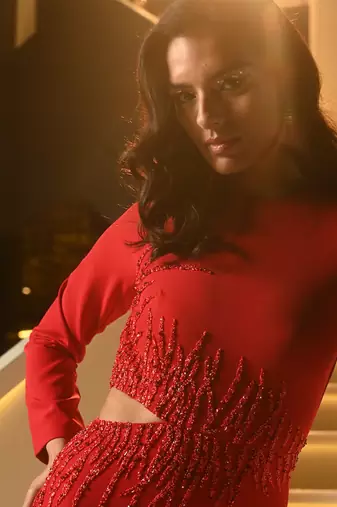 Red gown with side cutouts
