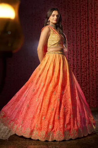 ENCHANTING ORANGE PINK PRINT WITH EMBROIDERED ORGANZA DESIGNER WEDDING PARTY WEAR FESTIVAL SEMIT STITCHED LEHENGA CHOLI