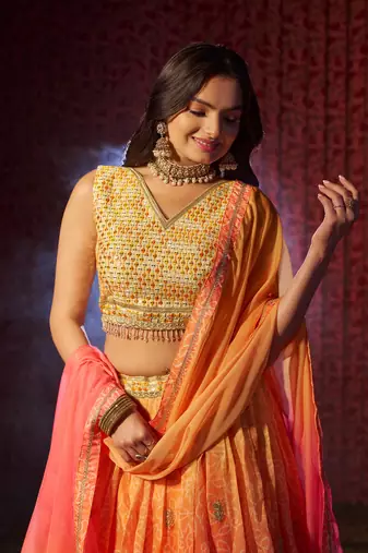 ENCHANTING ORANGE PINK PRINT WITH EMBROIDERED ORGANZA DESIGNER WEDDING PARTY WEAR FESTIVAL SEMIT STITCHED LEHENGA CHOLI