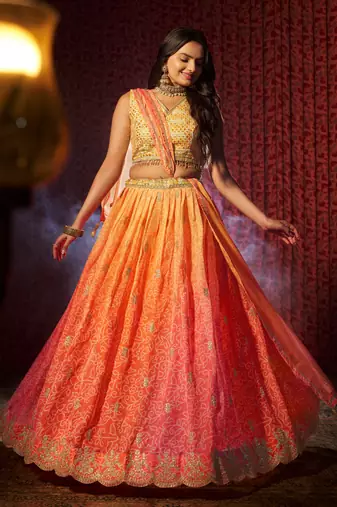 ENCHANTING ORANGE PINK PRINT WITH EMBROIDERED ORGANZA DESIGNER WEDDING PARTY WEAR FESTIVAL SEMIT STITCHED LEHENGA CHOLI