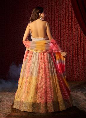YELLOW AND ORANGE PRINT WITH EMBROIDERED ORGANZA SEMI STITCHED LEHENGA CHOLI 4
