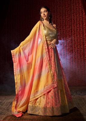 YELLOW AND ORANGE PRINT WITH EMBROIDERED ORGANZA SEMI STITCHED LEHENGA CHOLI 5