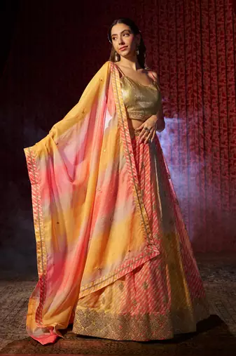 YELLOW AND ORANGE PRINT WITH EMBROIDERED ORGANZA SEMI STITCHED LEHENGA CHOLI