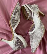 White hand embroidery net and embroidery heels