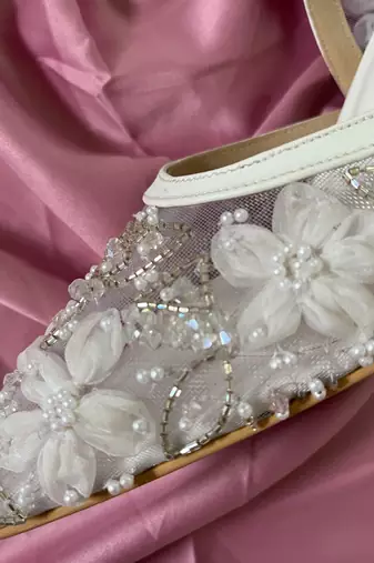 White hand embroidery net and embroidery heels