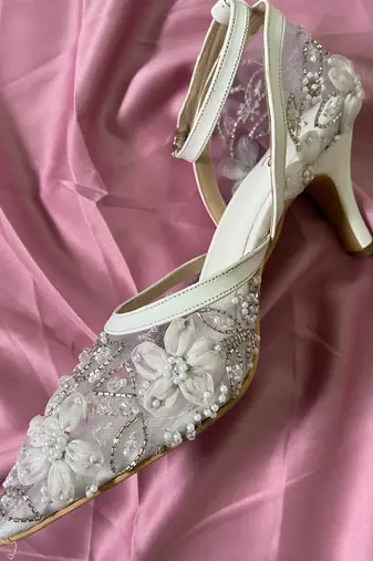 White hand embroidery net and embroidery heels