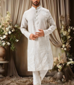 Off white linen embroidery thread work kurta pajama set