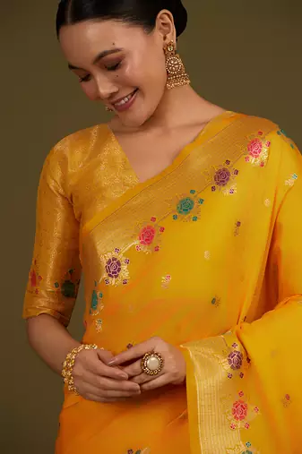 Yellow banarasi silk blend saree with zari woven work