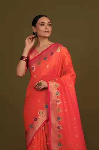 Dark peach banarasi silk blend saree with zari woven work