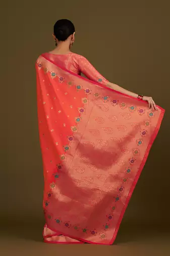 Dark peach banarasi silk blend saree with zari woven work