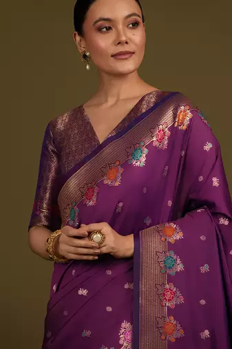 Dark violet banarasi silk blend saree with zari woven work