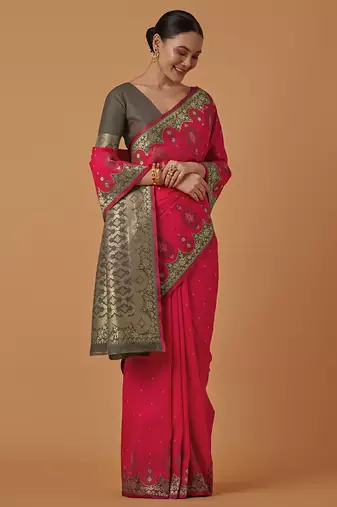 Pink banarasi silk blend saree with zari woven work