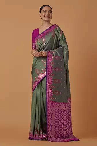 Olive banarasi silk blend saree with zari woven work