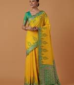 Yellow banarasi silk blend saree with zari woven brocade design & unstitched blouse piece