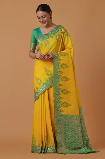 Yellow banarasi silk blend saree with zari woven work