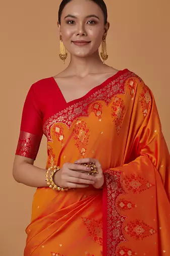 Amber banarasi silk blend saree with zari woven work