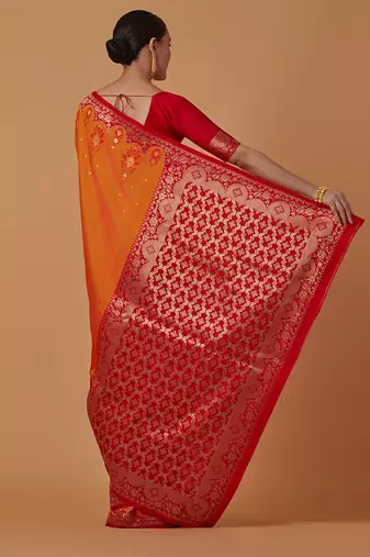 Amber banarasi silk blend saree with zari woven work