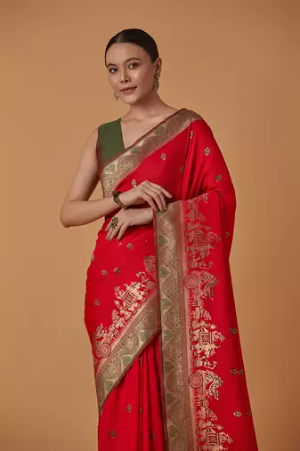 Red banarasi silk blend saree with dulha dulhan zari woven detailing