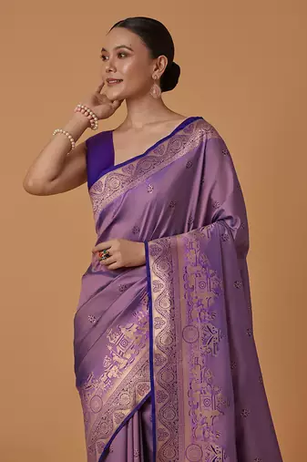 Lavender banarasi silk blend saree with dulha dulhan zari woven detailing