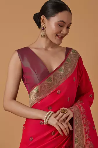 Pink banarasi silk blend saree with dulha dulhan zari woven detailing