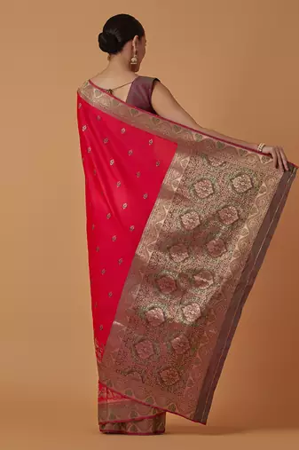 Pink banarasi silk blend saree with dulha dulhan zari woven detailing