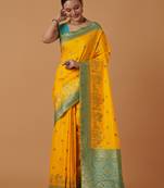 Yellow banarasi silk blend saree with dulha dulhan zari woven detailing