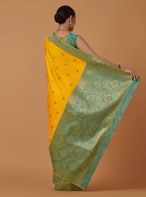 Yellow banarasi silk blend saree with dulha dulhan zari woven detailing 2