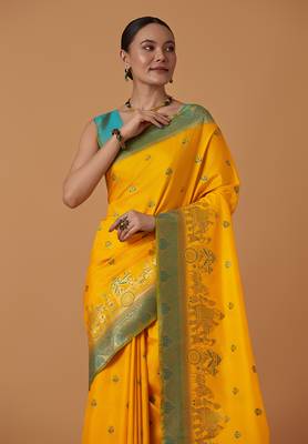 Yellow banarasi silk blend saree with dulha dulhan zari woven detailing 3