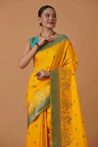 Yellow banarasi silk blend saree with dulha dulhan zari woven detailing
