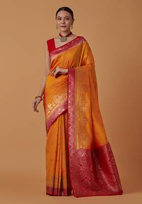 Amber banarasi silk blend saree with dulha dulhan zari woven detailing 1