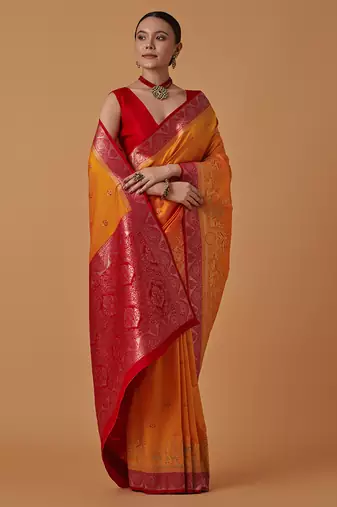 Amber banarasi silk blend saree with dulha dulhan zari woven detailing