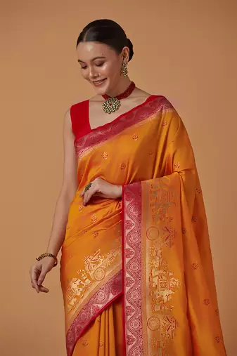 Amber banarasi silk blend saree with dulha dulhan zari woven detailing