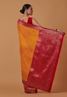Amber banarasi silk blend saree with dulha dulhan zari woven detailing 4