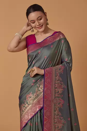 Olive banarasi silk blend saree with dulha dulhan zari woven detailing
