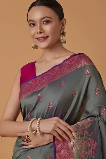 Olive banarasi silk blend saree with dulha dulhan zari woven detailing