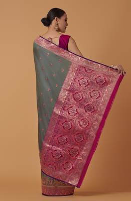 Olive banarasi silk blend saree with dulha dulhan zari woven detailing 4