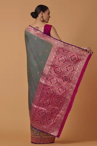 Olive banarasi silk blend saree with dulha dulhan zari woven detailing