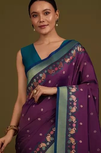 Dark purple banarasi silk blend saree with paisley zari pallu