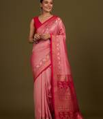 Light pink banarasi silk blend saree in classic paisley zari pallu & unstitched blouse