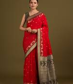 Red banarasi silk blend saree in classic paisley zari pallu & unstitched blouse