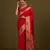 Red woven silk blend saree with floral motifs zari work