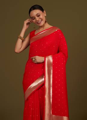 Red woven silk blend saree with floral motifs zari work 2