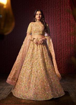 CAPTIVE BEIGE NET THREAD SEQUINS NET EMBROIDERED BRIDAL WEDDING FEESTIVAL SEMI STITCHED LEHENGA CHOLI 1