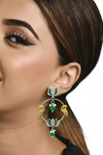 Silver-plated kundan studded lotus tribal drop earrings