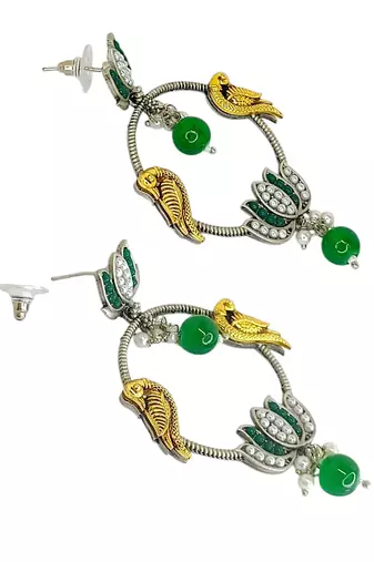 Silver-plated kundan studded lotus tribal drop earrings